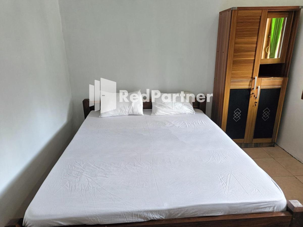Jogo Segoro Homestay Mitra Reddoorz Near Pantai Sundak Gunungkidul Ngandong エクステリア 写真